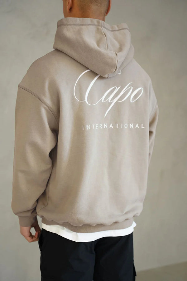 Capo International relaxed fit hoodie with dropped shoulder - BEIGE